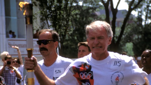 sam shelton carries the olympic torch in 1996