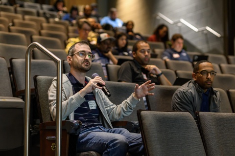 People inside the Ferst Center during a Q&A session