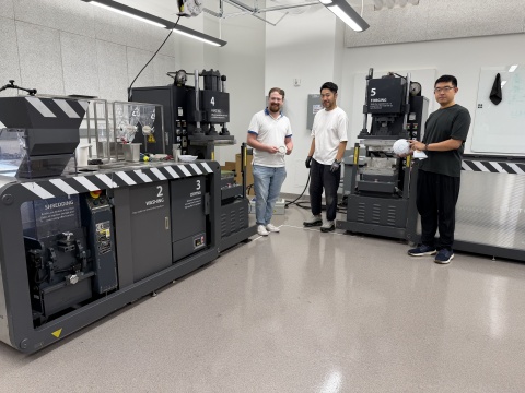 Pictured left to right: Tim Trent, IPaT’s lab director for the Trash Lab; Arthur Huang, CEO of Miniwiz; and Tai Liu, mechanical engineer with Miniwiz. In this picture, they are installing the miniTrashpresso system in the TSRB building.