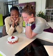 Fifth-year Chemical Engineering major Dara Jakande and third-year Chemistry major Sammy Rizzo admire their “fraisier," a French sponge cake made with strawberries.