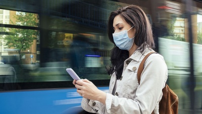 A woman looking at her phone