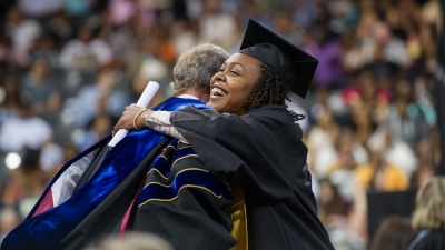 graduate at commencement