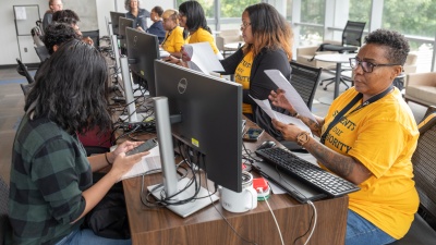 Picture of student completing in-person onboarding. 