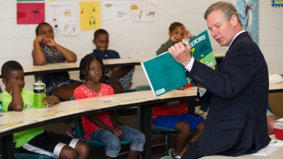 Georgia Tech President George P. "Bud" Peterson reads to students in the Horizons@GT program.