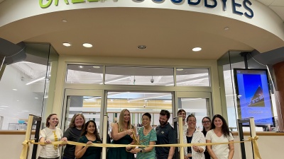 Green Goodbyes Ribbon Cutting