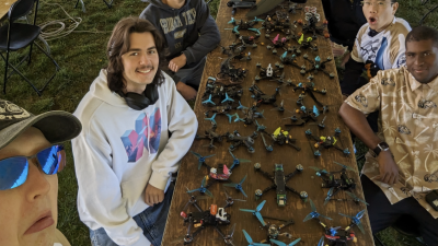 RotorJackets pose in front of their drones at the Collegiate Drone Racing Championship