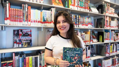 Shamim Shoomalim with her book, 'Between Classes.'