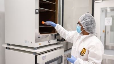 A researcher in the Marcus Center of Excellence for Cell Biomanufacturing removes cultured cells from an incubator for further characterization and testing.