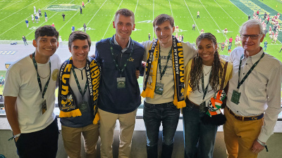 Dick Bergmark (right) and students