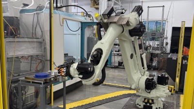  A robotic arm moves amongst AMPF facilities