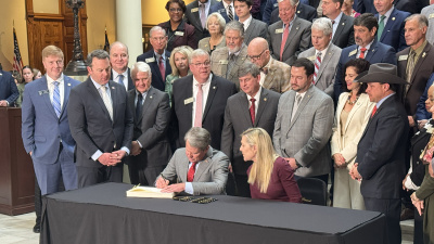Gov. Brian Kemp signs the amended FY26 budget on March 3.