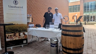 Alumni Christian Doetsch (left) and Seth Lytle brought their VinoBarrel demo to campus during the Tech Square Tech Hop in August.