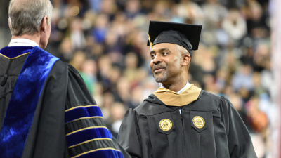Georgia Tech student receives diploma at commencement ceremony.