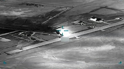  black and white aerial view of an airfield AI is helping U.S. forces find and choose targets in Iran, like this airfield. U.S. Central Command via AP