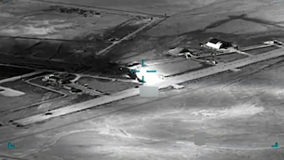  black and white aerial view of an airfield AI is helping U.S. forces find and choose targets in Iran, like this airfield. U.S. Central Command via AP