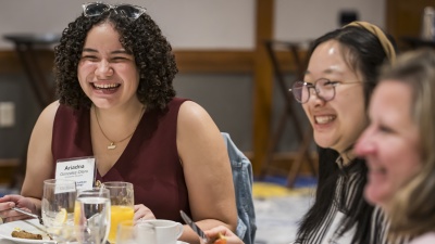 Students laughing at a table