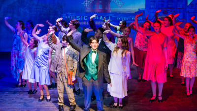 Theater group on stage.