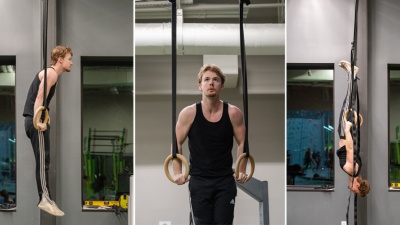 David Lloyd George holds a vertical position using gymnastic rings