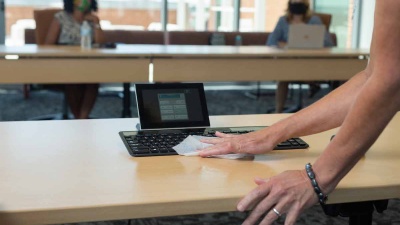 New health and safety guidelines for campus include the cleaning of offices and workspaces every day.