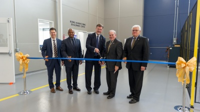 Boeing executives and Steve Cross, Georgia Tech executive vice president for Research, cut the ribbon to officially open the Boeing Manufacturing Development Center on campus.

Photo by Rob Felt.