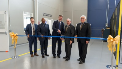 Boeing executives and Steve Cross, Georgia Tech executive vice president for Research, cut the ribbon to officially open the Boeing Manufacturing Development Center on campus.

Photo by Rob Felt.