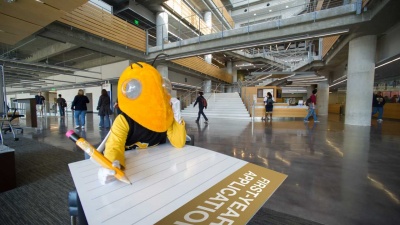 Buzz fills out an application to Georgia Tech.