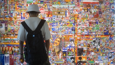 Student observing art display on campus. Photo by Allison Carter