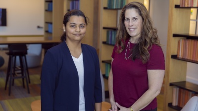 Cybersecurity master's student Sneha Talwalkar (left) and GTRI Principal Research Scientist Courtney Crooks (right) are working to bring relief to survivors of domestic abuse by building on developments recently made in cognitive security. (Photos by Kevin Beasley/College of Computing)
