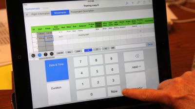 Students stationed in different zones throughout an aircraft recorded the movement of passengers using this iPad application. (Credit: Emory University)