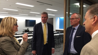 Jennifer Bonnett (left), general manager of Georgia Tech's Advanced Technology Development Center, explains how the incubator works with entrepreneurs across the state to Tech President G.P. "Bud" Peterson (center), Georgia Lt. Gov. Casey Cagle (right), and Chris Downing (near right), vice president of Tech's Enterprise Innovation Institute. Cagle visited the Tech campus Oct. 6 to learn more about the Institiute's innovation ecosystem. (Photo credit: Péralte C. Paul)