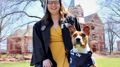 Celia Kornegay poses with her dog, Kramer Burdell, named after the well-known George P. Burdell.