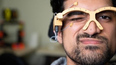 A squint is an example of a facial gesture that MagTrack can detect and issue a discrete command to control a connected device.