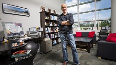 Alex Orso is pictured standing in his office on the Georgia Tech campus. He will assume the role of interim dean of the College of Computing, effective Aug. 1.

