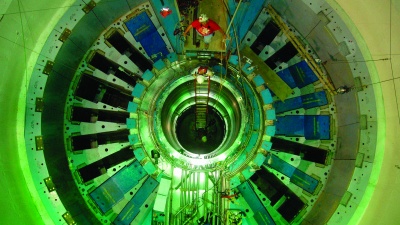 A massive part of Oak Ridge National Laboratory's Spallation Neutron Source during its construction phase in earlier years. The hole in the center is where the target crystal for neutron scattering is placed. Credit: Oak Ridge National Laboratory