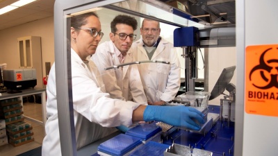 Researchers, from left, Lorena Chaves, Jose Assumpcao, and Philip Santangelo will be part of a collaborative effort to use mRNA drugs to enhance the body’s immune response. Santangelo is leading the $24 million project supported by the federal Advanced Research Projects Agency for Health. (Photo: Jack Kearse/Emory University)
