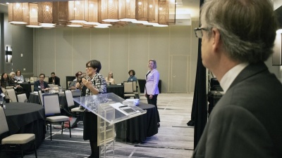 Paula M. Krebs, foreground, executive director of the Modern Languages Association, answers a question during the humanTech symposium on humanistic perspectives at technological universities at the Renaissance Hotel Midtown on April 19, 2019. Anna Stenport, chair of the School of Modern Languages, background, and Richard Utz, chair of the School of Literature, Media, and Communication, foreground, listen.