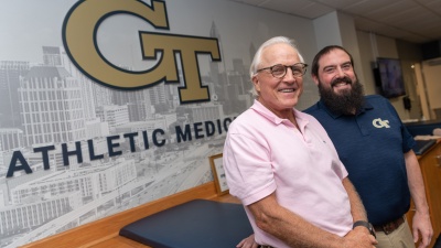 The Georgia Tech Athletic Association's Randy Rhino (left), chiropractor, and Charlie Ridgeway, physical therapist, treat many on-campus patients in addition to student-athletes. Photo by Rob Felt.