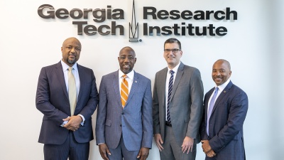 Sen. Raphael Warnock hears from GTRI Director Jim Hudgens and Deans Charles Isbell and Raheem Beyah.