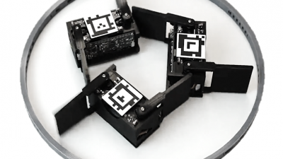 When a swarm of smarticles is made to interact in a confined space, they form stunningly symmetric dances whose choreography emerges spontaneously from the physics of low rattling. (Credit: Thomas A. Berrueta)