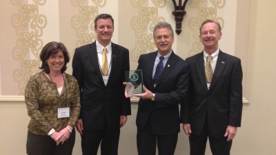 The Georgia Institute of Technology received an "Innovation" award from the Association of Public and Land-grant Universities for its statewide economic development efforts in a number of sectors. Accepting the award are (l-r), Lynn Durham, assistant vice president; Robert Knotts, director of federal relations; Chris Downing, associate vice president, Enterprise Innovation Institute, and William "Bill" Schafer, vice president of student affairs.