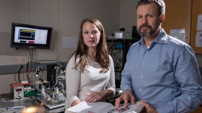Using optogenetics and other technology, researchers have for the first time precisely manipulated bursting activity of cells in the thalamus, tying it to the sense of touch. Shown are Georgia Tech graduate student Clarissa Whitmire and Georgia Tech professor Garrett Stanley.(Credit: Rob Felt, Georgia Tech)