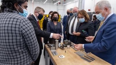 Thomas Kurfess (rear left), professor and HUSCO/Ramirez Distinguished Chair in Fluid Power and Motion Control in Georgia Tech's George W. Woodruff School of Mechanical Engineering, explains some of the metallurgy testing that occurs at the Advanced Manufacturing Pilot Facility as (l-r)  U.S. Department of Commerce Secretary Gina M. Raimondo, Professor Aaron Stebner, Assistant Commerce Secretary Alejandra Castillo, and Georgia Tech President Àngel Cabrera listen. Commerce Department officials were in