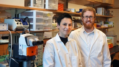 Brandon Dixon, researcher in the School of Mechanical Engineering, with Dr. Zhanna Nepiyushchikh in the lab. 