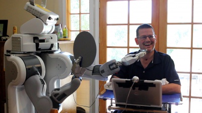 Charlie Kemp, director of the Healthcare Robotics Lab, is working with Henry Evans, who lives with quadriplegia. As part of the Robots for Humanity project Evans briefly used a robot to shave. Evans is at his home using the robot.