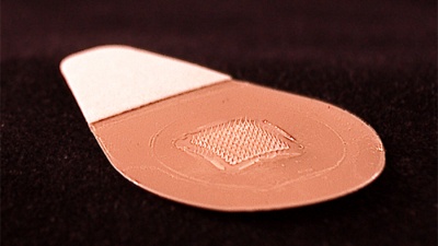 This close-up image shows the microneedle vaccine patch, which contains tiny needles that dissolve into the skin, carrying vaccine. A majority of study participants said they would prefer to receive the influenza vaccine using patches rather than traditional hypodermic needles.