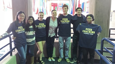 Students in the Smithgall Student Services (Flag) Building after completing their peer coaching training in fall 2017