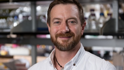 Tom Barker, an associate professor in the Wallace H. Coulter Department of Biomedical Engineering at Georgia Tech and Emory University, is shown in his laboratory in Georgia Tech’s Engineered Biosystems Building. Barker has received a $3.5 million, five-year grant to support research into new approaches for tracking and treating pulmonary fibrosis. (Credit: Rob Felt, Georgia Tech)