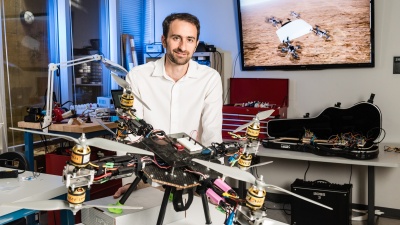 Jonathan Rogers with an autonomous flying quadcopter that could, in the future, lift a soldier.