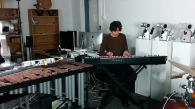 Ph.D. candidate Mason Bretan and team of robots collaborate on an original, Miles Davis-inspired composition.