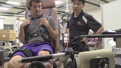 Minoru Shinohara, an associate professor in the School of Applied Physiology and one of the study's researchers, watches a student during a resistance exercise. 